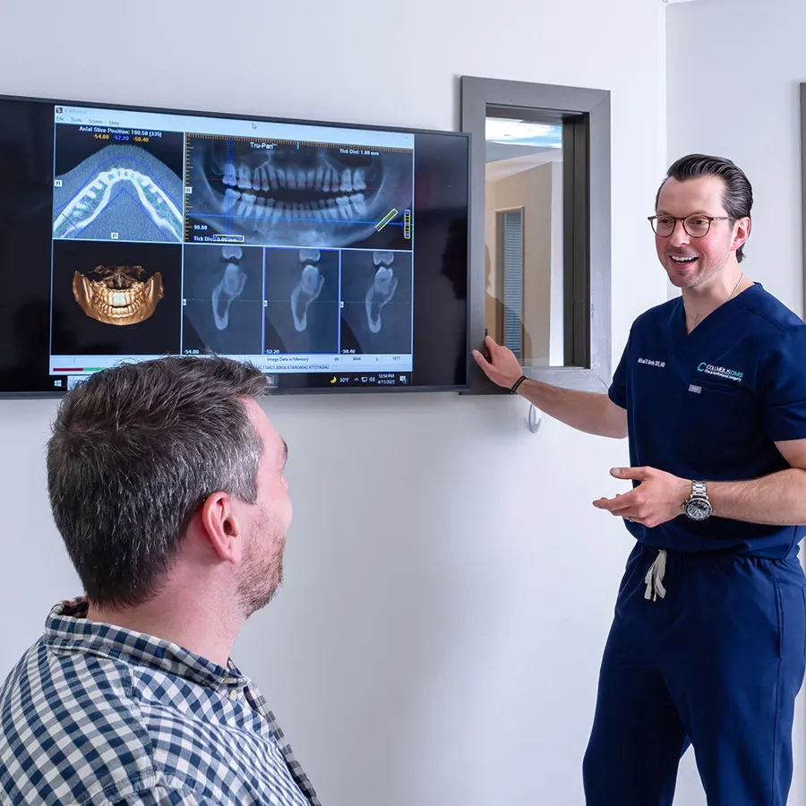 Doctor going over x-rays with patient